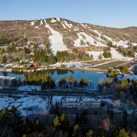 NEW Ski in/out condo with Mt views, hot tub, porch, gym & wifi!