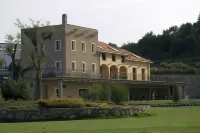 Castellaro Golf Resort Hotels near Spiaggia La Fortezza
