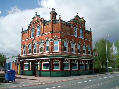 The Whittington and Cat Hotels near The Parish Church of All Saints