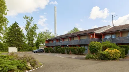 Campanile NATURE - Sannois Ermont Отели рядом с достопримечательностью «Hippodrome d'Enghien-Soisy»