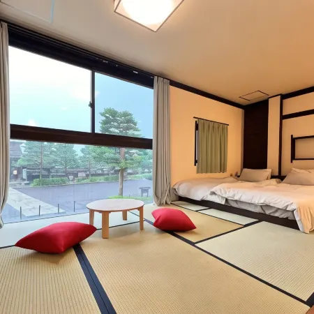 Jinya Sunset Inn by Murasaki Ryokan Отели рядом с достопримечательностью «Окухида Онсенго»