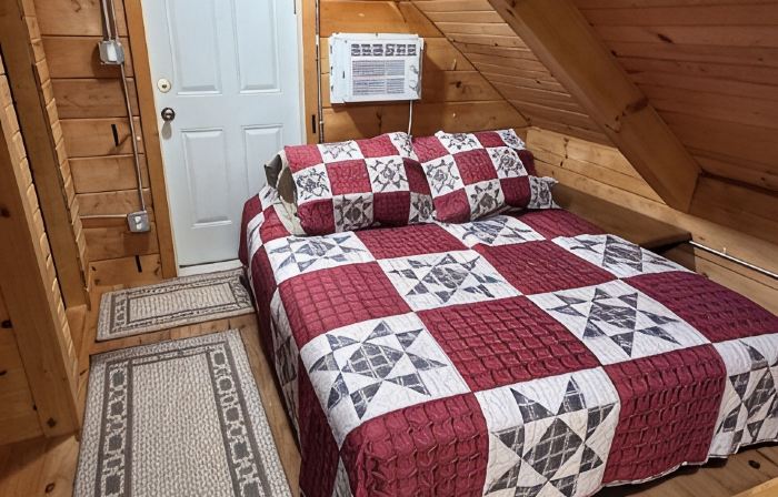 Cozy log cabin located in downtown Moravia, Iowa.