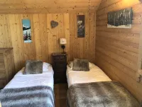 Chalet with nice view, garden and hot tub. Ideal for skiing and cycling!