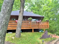 Stunning Sunrises from spacious Big Round Lake Cabin Hotels in Round Lake