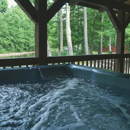 Fall Foliage Riverfront Cabin w/Hot Tub, King Bed, EV & Firepit & Mountain Views