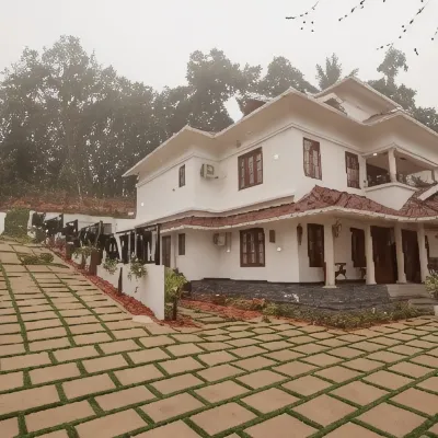 Tatvaura Resort Wayanad Отели рядом с достопримечательностью «Водопады Меенмутти»