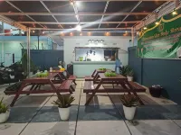 RedDoorz Syariah at Naffa Homestay Hotels near Masjid Al Falah