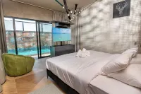 Naomi Boutique Suites Các khách sạn ở Elon