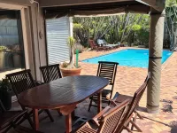 Secret Garden Guesthouse Hotels in Bloubergstrand