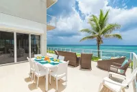 Ocean's Edge: Beachfront Home with Rooftop Views
