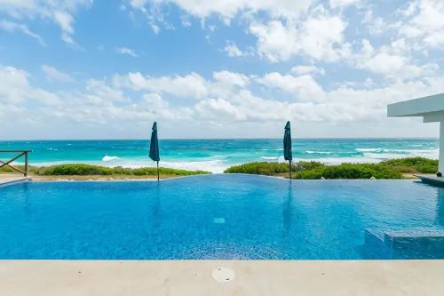 Brand New 12 Suite Villa  directly on the waters edge of the Caribbean Sea - Villas