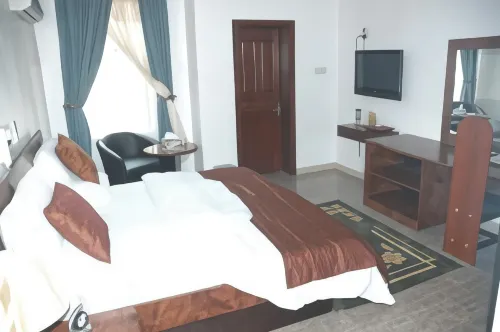 Madugu Hotel and Luxury Apartments - bar