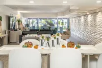 Waterfront Oasis 2BR/2BA with Pool, Gym, Balcony & Parking