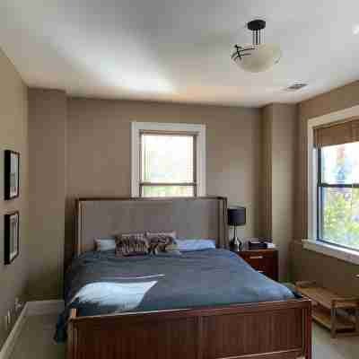 Beautiful 3-bedroom condo just steps from the track and downtown! Rooms
