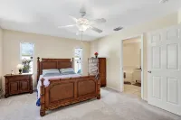 Fenced, private, family friendly villa with exotic poolside views near airport. - Wifi