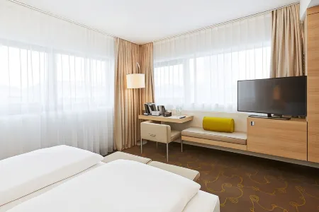 H+ Hotel Salzburg Отели рядом с достопримечательностью «Marionette Museum»