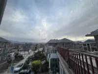 Floral Hotel·  Qilian Xiaozhu Hotel (Zhangye Danxia) - Bergblick