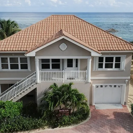 Coco Kai Beach Front Villa with Heated Pool and Private Dock