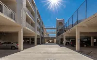Cozy Beach Condo with Private Beach, Heated Pool, High Speed WiFi, and More.