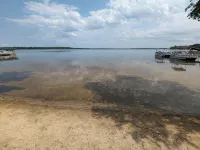 NEW! Renovated lakeside cottage with a private sandy beach. Great Location!