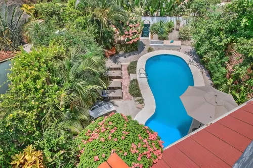 Large, Private/Gated Home in Golden Zone. Pool, Big Yard & 3 blocks to beach!