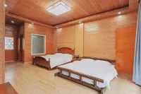 Qiannan Bamboo Sea Colorful sunshine Southeast Holiday Homestay - Quầy Bar