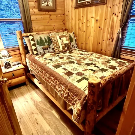 Relax in a cozy and private lake front cabin with breathtaking views!