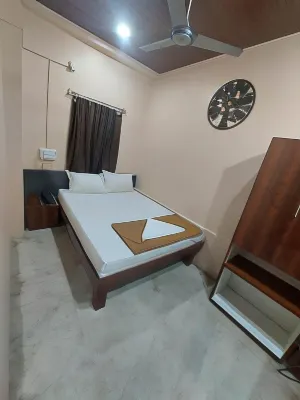 Iroomz City Lite Lodge Hotels near Mysamma temple