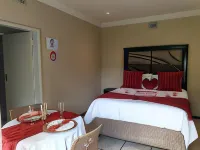 Suits Guest House & Bar