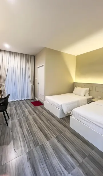 ห้องดีลักซ์เตียงแฝดพร้อมวิวสวนหย่อม