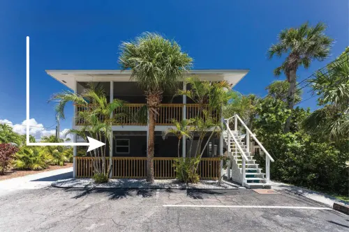 Deeded Beach Access and Private Balcony - Charming Coastal Haven