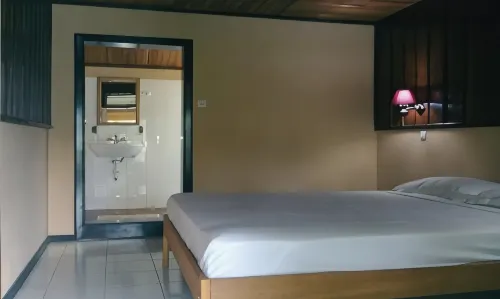 Ue Datu Cottages Отели в г. Посо