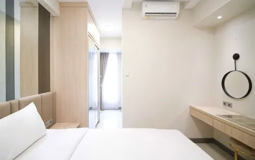 Best Price and Comfortable Living 2Br at Anderson Supermall Mansion Apartment by Travelio
