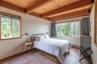 Deception Pass home with forest and bay views