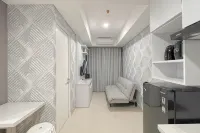 Grey Toned 1BR Apartment Tamansari Skylounge Makassar By Travelio - Apartments