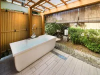 Yuraku Hotel - Pemandian Air Panas