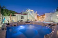 Private pool villa with water massage pool and sea view roof garden - Villas