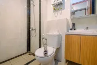 Comfy Design Studio at Grand Kamala Lagoon Apartment by Travelio