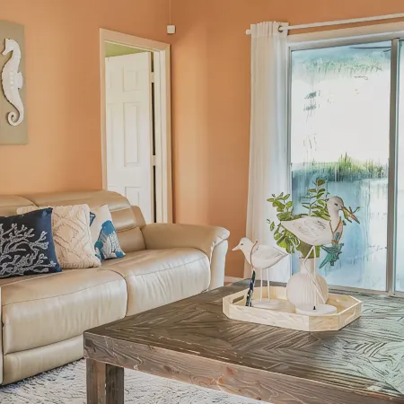 Come Home to Paradise….Screened in pool with covered lanai and hot tub