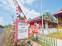 OYO 91246 Pulisan Ekowisata Homestay Near Wisata Pantai Desa Pulisan (Pulisan Beach Tour) Hotel dekat Toko Gunung Kawi
