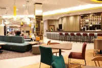 Hampton by Hilton Munich Airport South فنادق في Hallbergmoos