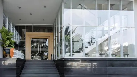 Atlantic City Hotel Отели в г. Cicendo