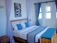 4-bedroom villa in enchanting Pazuri in Kilifi County with AC, WiFi Hotels in Kilifi