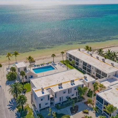 BEACHFRONT CONDO on Coco Plum Beach with Heated Pool