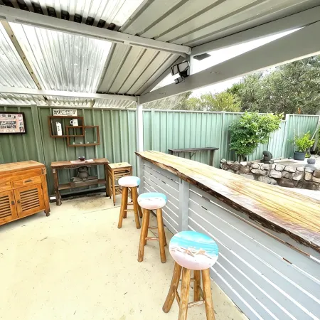Tuncurry Tranquility family and dog friendly house / garden conveniently located