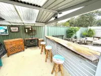 Tuncurry Tranquility family and dog friendly house / garden conveniently located