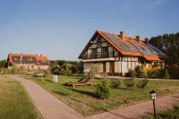 OSTOJA DWA JEZIORA Mazury Węgorzewo apartamenty, domki z jacuzzi lub z kominkiem - 3-Star
