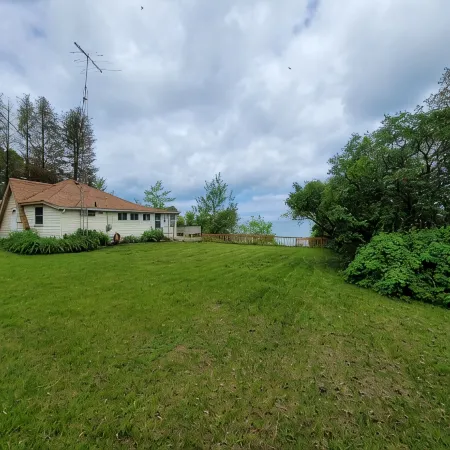 Cozy Lake Huron Cottage, with Internet, Summer Months Beach Access.