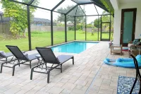 NEW Coastal Paradise GEM!! Spacious 4BR, 3 Full Baths w/Pool!! PET FRIENDLY!!! - piscina
