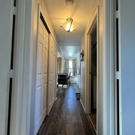 Cozy two Bedroom close to lake. Dogs Allowed. Semi private Hot Tub. Large Yard.